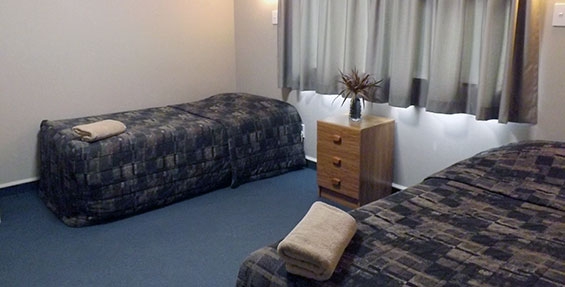 the second bedroom has two single beds
